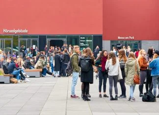German students on the university campus in Leipzig during a break in Germany
