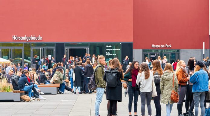 German students on the university campus in Leipzig during a break in Germany