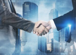 Business people shaking hands for Partneship
