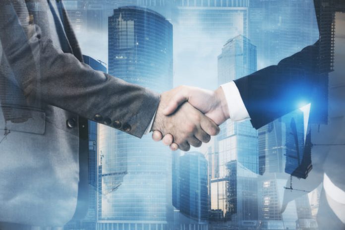 Business people shaking hands for Partneship
