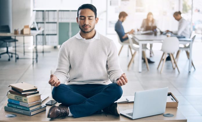 Meditation, relax or businessman with laptop, books or zen peace in office desk for work mindfulness, wellness or mental health