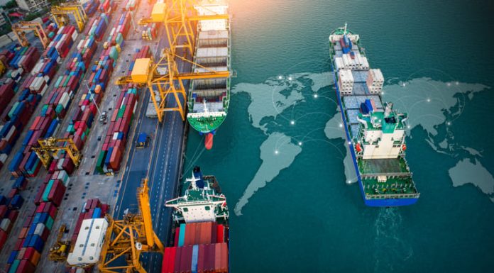 Powering the Next Industrial Shift: How IoT and Renewable Energy Are Redefining Global Supply Chains ontainers ship cargo business commercial trade logistic and transportation of international import export by container freight cargo ship with on worldmap