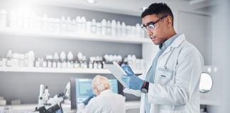 Scientist, tablet and clinical research innovation in laboratory for medical analytics, science development or biotech neuroscience.