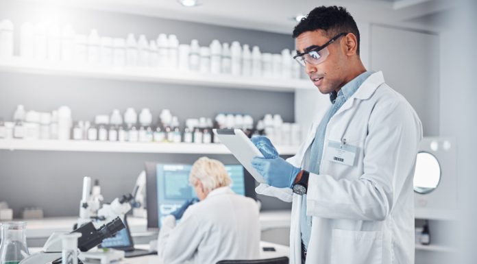 Scientist, tablet and clinical research innovation in laboratory for medical analytics, science development or biotech neuroscience.