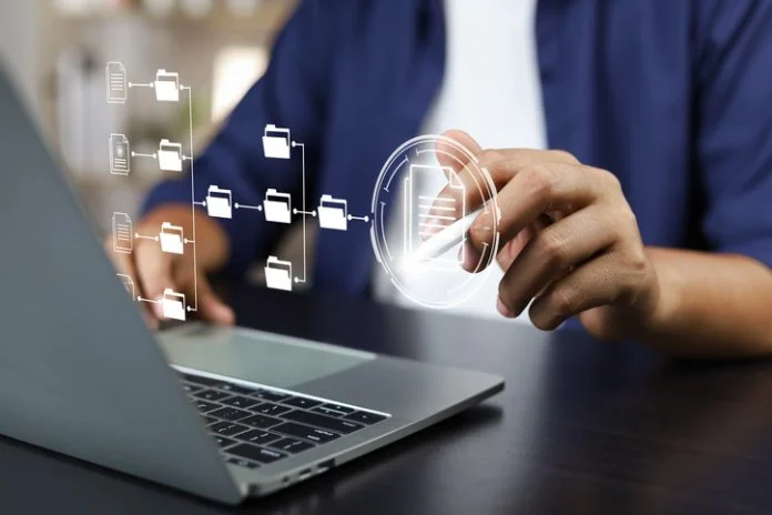 Document management system concept (DMS), Businessman working laptop virtual screen icons folder and document management system, Software for archiving, Searching and managing files corporate document Document management system and records concept (DMS), Businessman working laptop virtual screen icons folder and document management system, Software for archiving, Searching and managing files corporate document