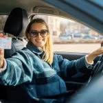 Woman holding a driver's license in Germany