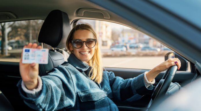 Woman holding a driver's license in Germany