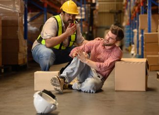 Reducing Workplace Injuries with Powered Handling Equipment: What You Need To Know Worker handling large cardboard boxes then some of the box falling and hit by accident