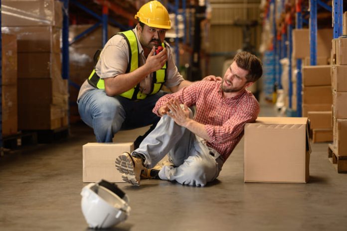 iStock-2150083647 (1) Worker handling large cardboard boxes then some of the box falling and hit by accident