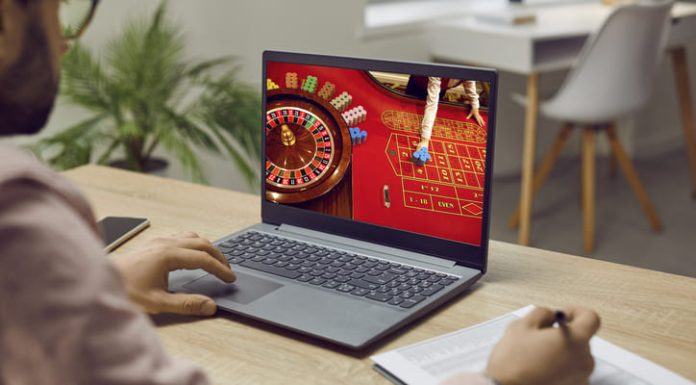 Digital Loyalty in the Attention Economy: What Social Casinos Teach Us About Engagement Strategy person playing online casino for social and engagement