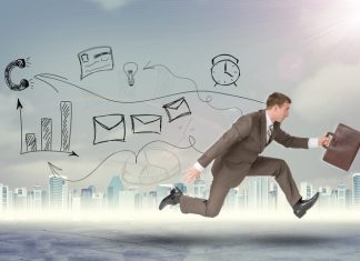 Businessman running high speed with suitcase
