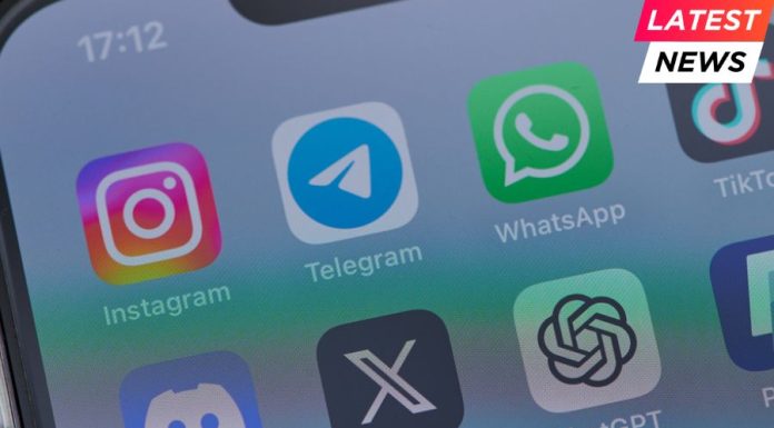 iphone on a table showing icons of the apps instagram, telegram, tiktok, twitter, discord, telegram, chatgpt and paypal