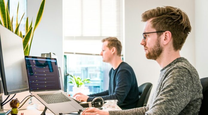 Developers working hard for an AI agent