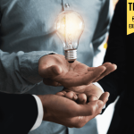 What is Intrapreneurship? Innovation From Within the Company Innovation and idea of professional leader with teamwork holding lighting bulb, brainstorming teamwork, intrapreneurship and thinking management concept