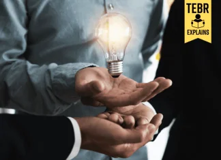 Innovation and idea of professional leader with teamwork holding lighting bulb, brainstorming teamwork, intrapreneurship and thinking management concept