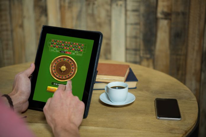 Man playing in online gambling