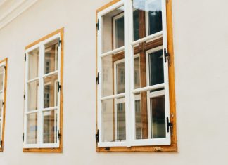 sash wooden windows in perspective on a white wall