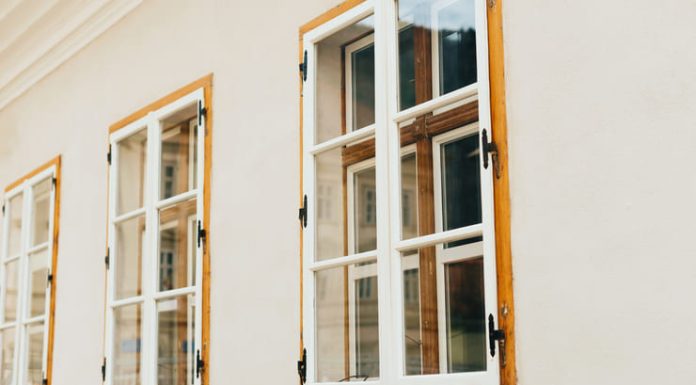 sash wooden windows in perspective on a white wall