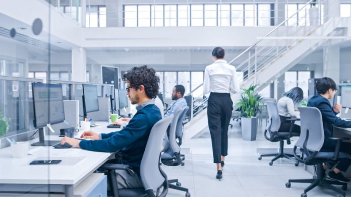 Beautiful Female Manager is Walking Pass Her Business Colleagues while working, experiments to optimize AI and algorithmic attachments.