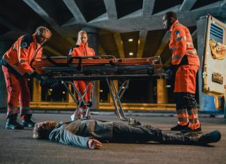 You Just Got Hurt in a Car Crash. Now What? Emergency Care Assistants Arrived on the Scene of a Traffic Car Accident on a Street at Night.