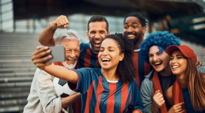 Player of sports and fans taking a selfie