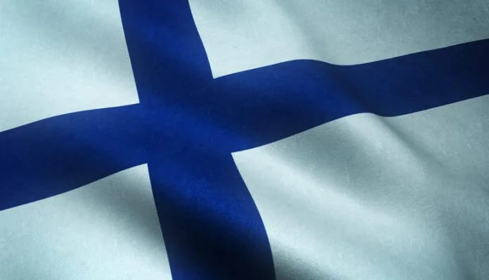 Closeup shot of realistic waving flag of Finland with interesting textures