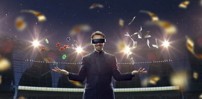 Handsome businessman in VR glasses standing on 3D sport arena with many chips, tokens. Online game.