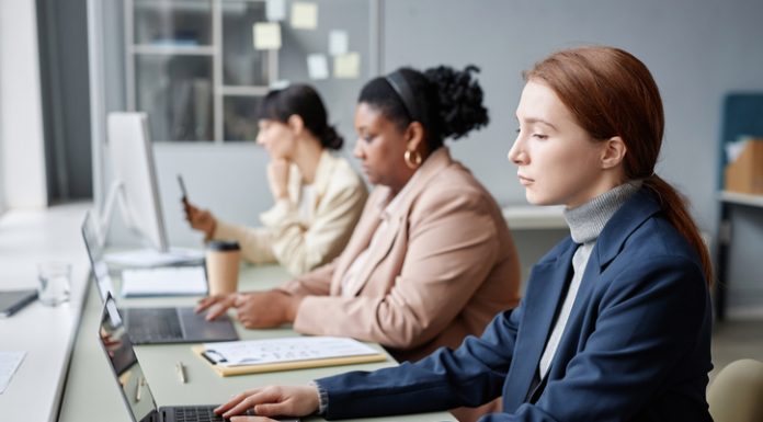 Women in Tech Working on Computers in Office