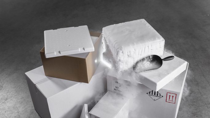 various dry ice packaging styrofoam boxes inside cardboard boxes for shipping.