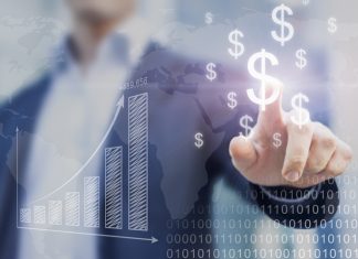 Businessman William Hathaway presenting financial analysis with charts generated by big data displaying international success and dollar signs