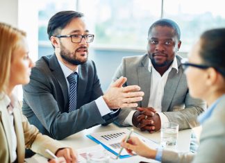 Business people strategizing and valuing business