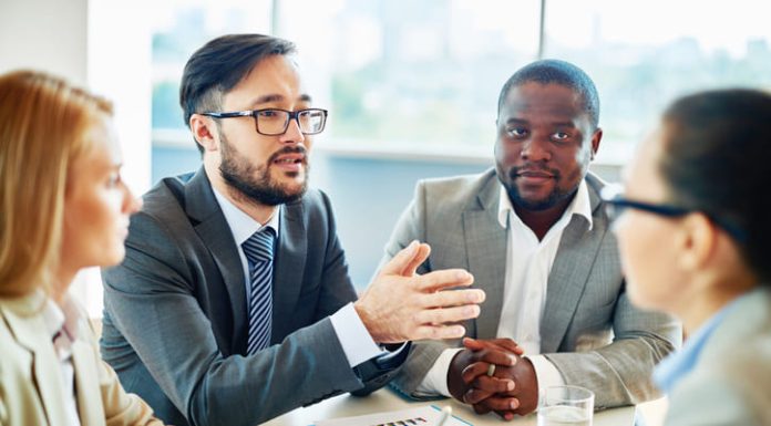 Business people strategizing and valuing business