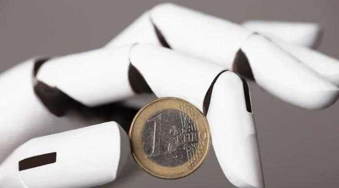 AI bot holding Euro coin. AI in Europe concept