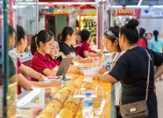 Young women buy gold