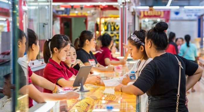 Young women buy gold