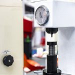 diamond head pin and adjustment move up down table of Rockwell hardness tester machine for inspection property hardness value of specimen sample material or product