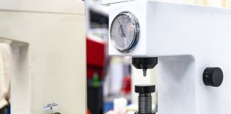 Mastering Material Testing: A Comprehensive Guide to Rockwell Hardness Testers diamond head pin and adjustment move up down table of Rockwell hardness tester machine for inspection property hardness value of specimen sample material or product