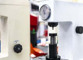 diamond head pin and adjustment move up down table of Rockwell hardness tester machine for inspection property hardness value of specimen sample material or product