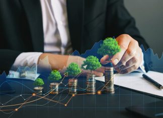Eco business and nature investment. Green business growth. Businessman holding coin with tree growing on money coin stack. Finance sustainable development.