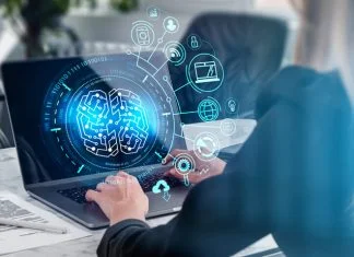 The Better Boards Podcast Series: Beyond Minutes – Reimagining the Board Secretary in the Age of AI Board secretary working in the office while using AI