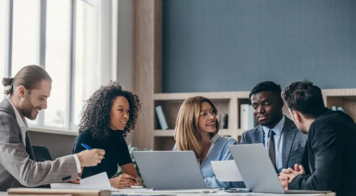 Master’s in Management (mim) students studying in library