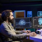 How Remote Work Tools Are Transforming European Businesses Man working at home using Remote Work Tools