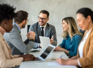 Businessman with emotional intelligence together with successful multiethnic business people working on teamwork meeting in corporate office.