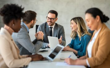 Businessman with emotional intelligence together with successful multiethnic business people working on teamwork meeting in corporate office.