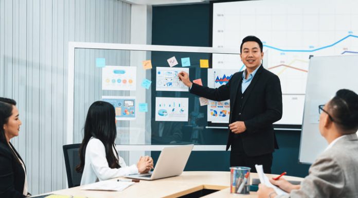 Chief marketing officer (CMO) having a presentation with the colleagues