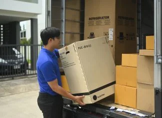 courier unloading a large box