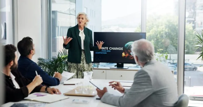 iStock-2225349168 (1) Presentation, paperwork and board directors in office with team for AI governance system.