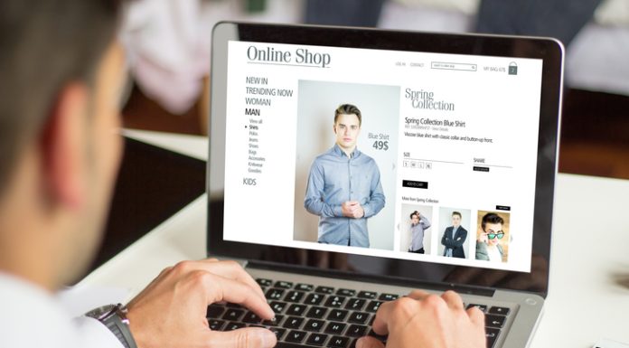 man personalized shopping online with a laptop, All screen graphics are made up.