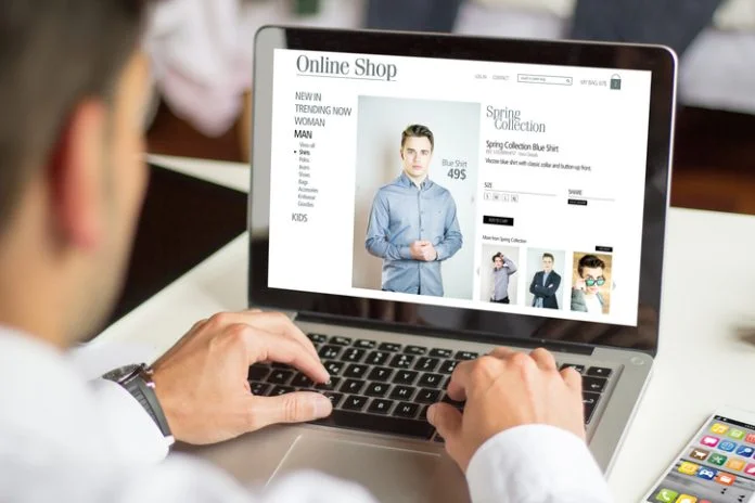 man personalized shopping online with a laptop, All screen graphics are made up.