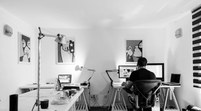 Man working on computer desk for Project-based businesses